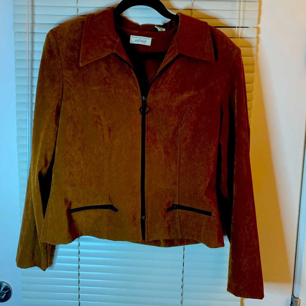Very soft brown, polyester woman’s jacket.